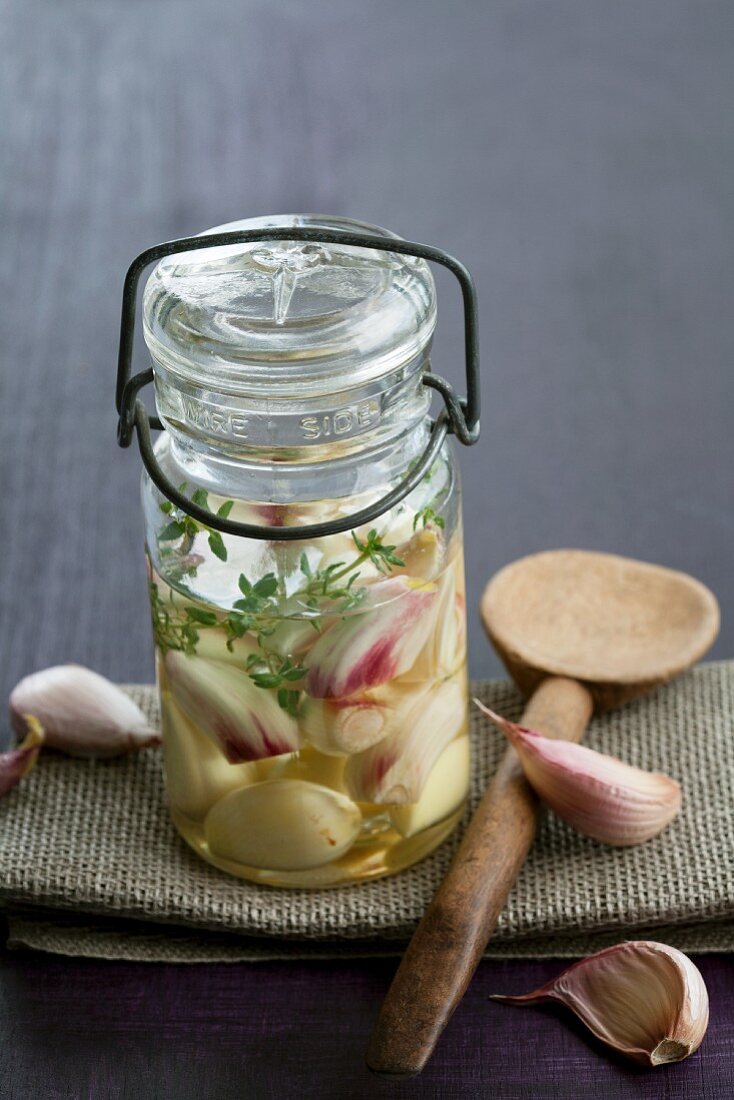 Pickled garlic with thyme