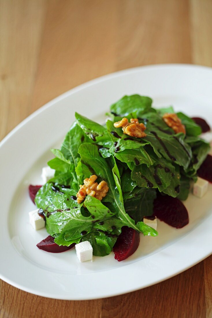 A rocket salad with beetroot, walnuts and feta cheese