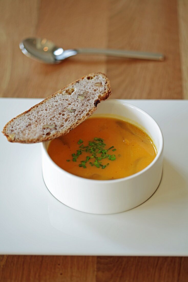 Pumpkin soup and a slice of bread
