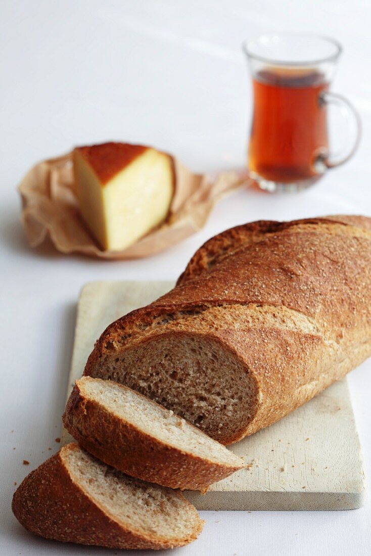 Wheat bread with smoked cheese and tea (Turkish)