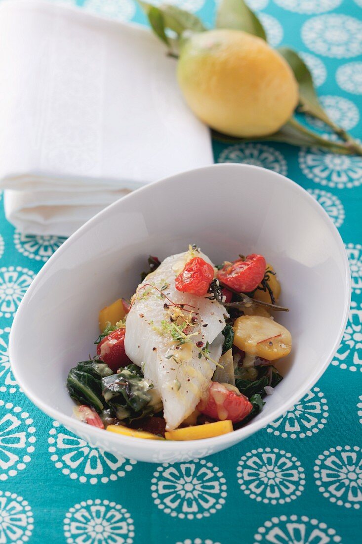 Fish fillet with vegetables and lemon sauce