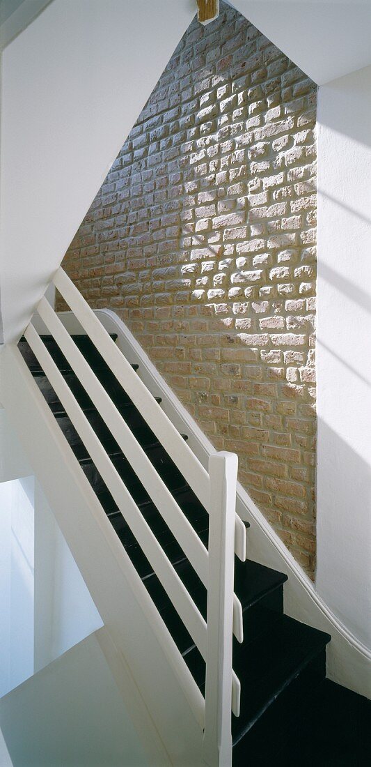 Staircase in modernised, rustic country house