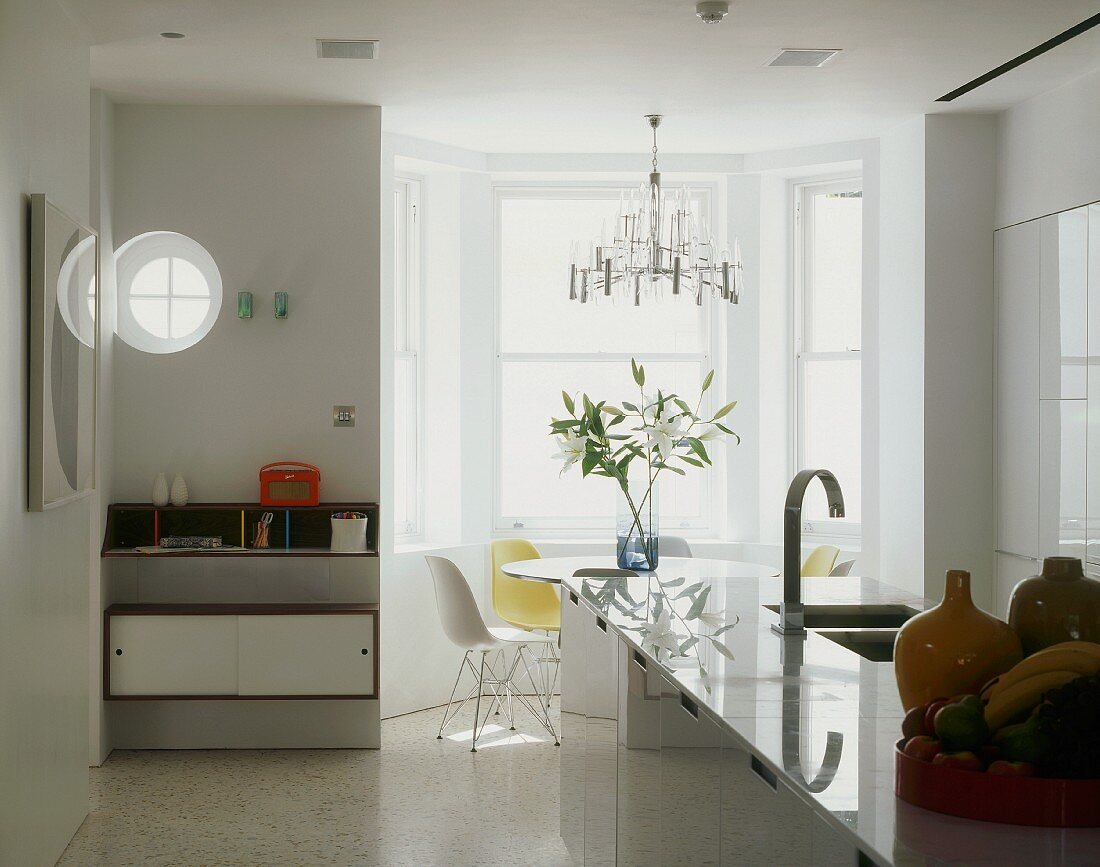 Open living space with kitchen & seating in bay window