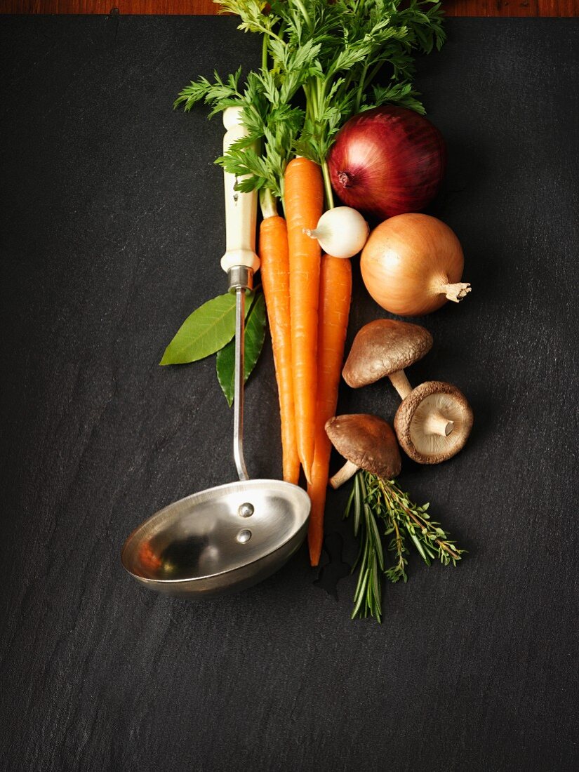 Ingredients for soup (vegetables, mushrooms and herbs)