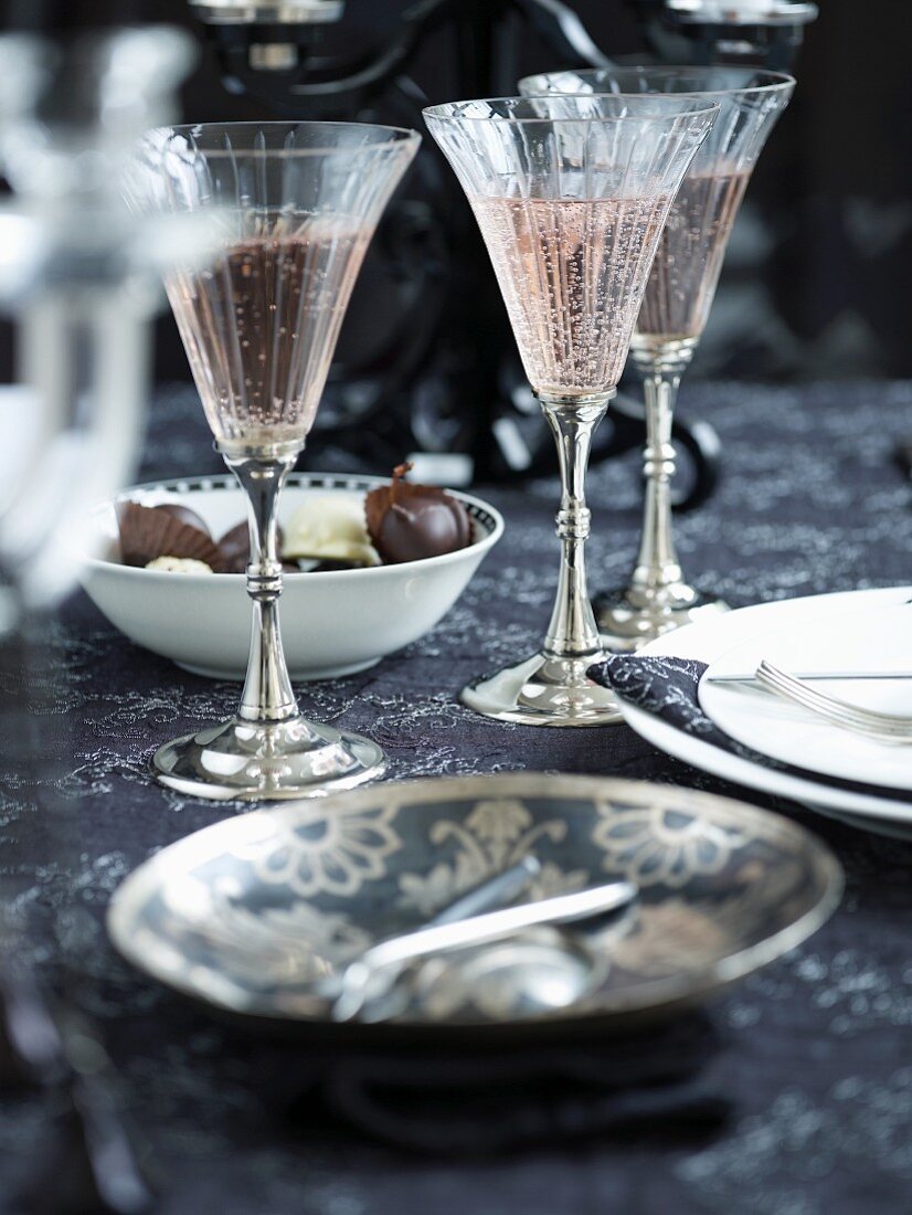 Champagne glasses and pralines