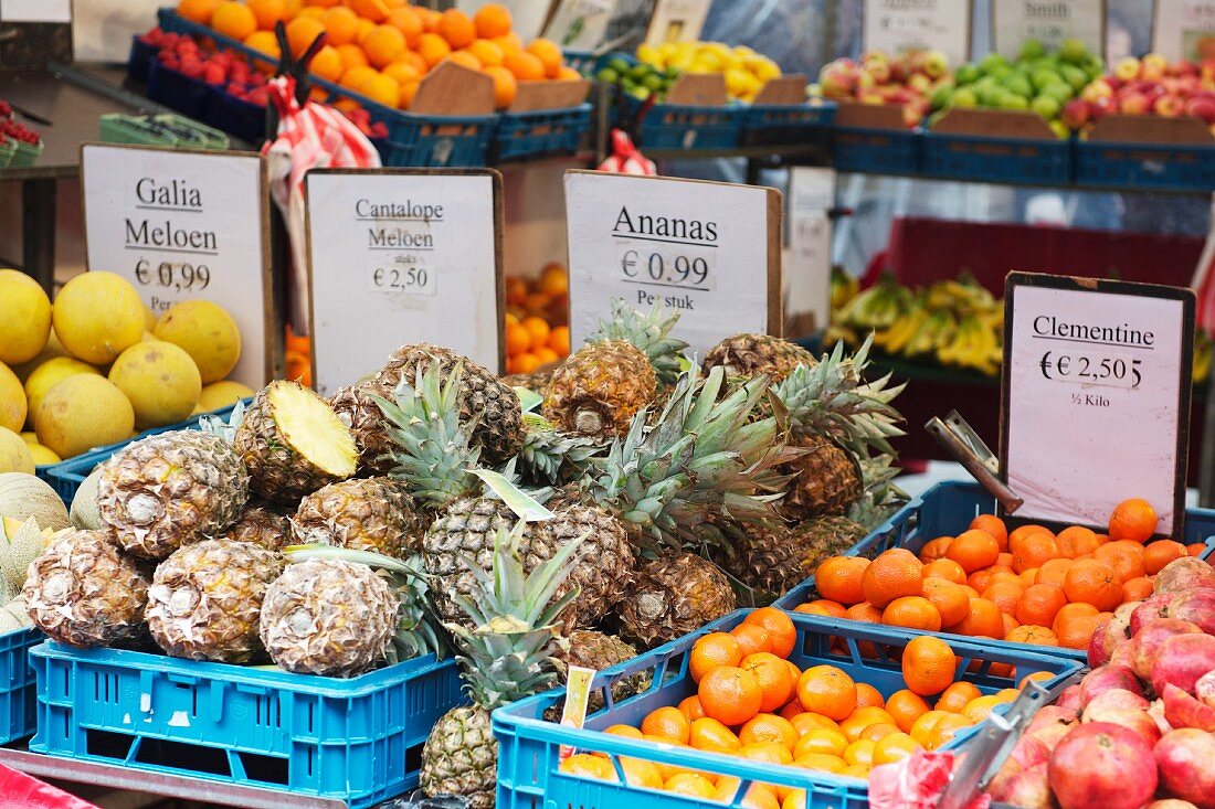 Various fruits in crates at market