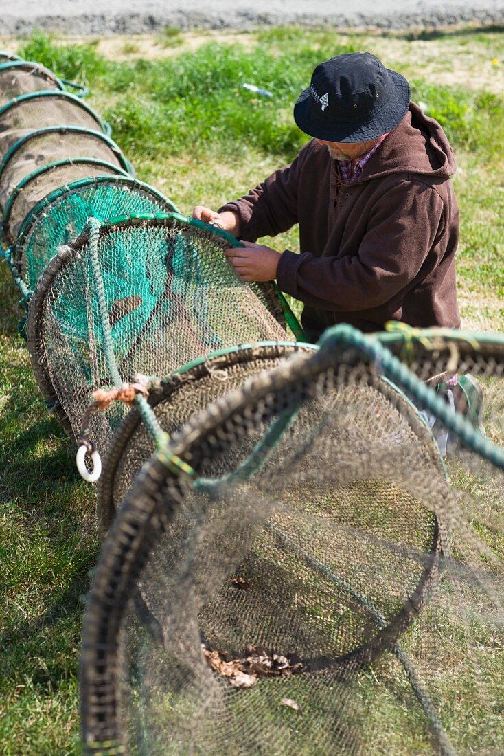Fisherman with fish trap