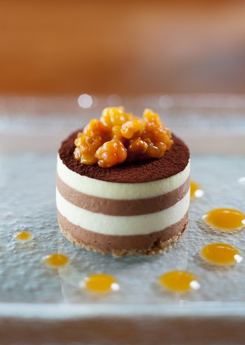 Mini chocolate mousse tart with cloudberry sorbet