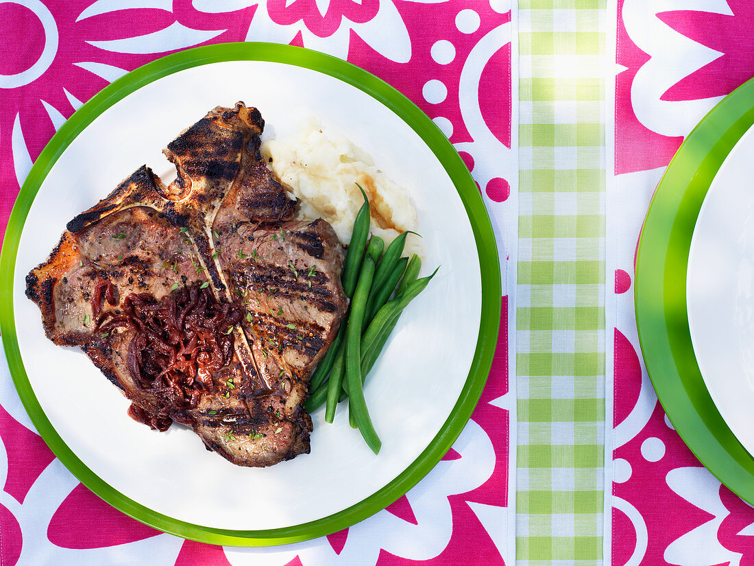 T-bone steak with red onion sauce