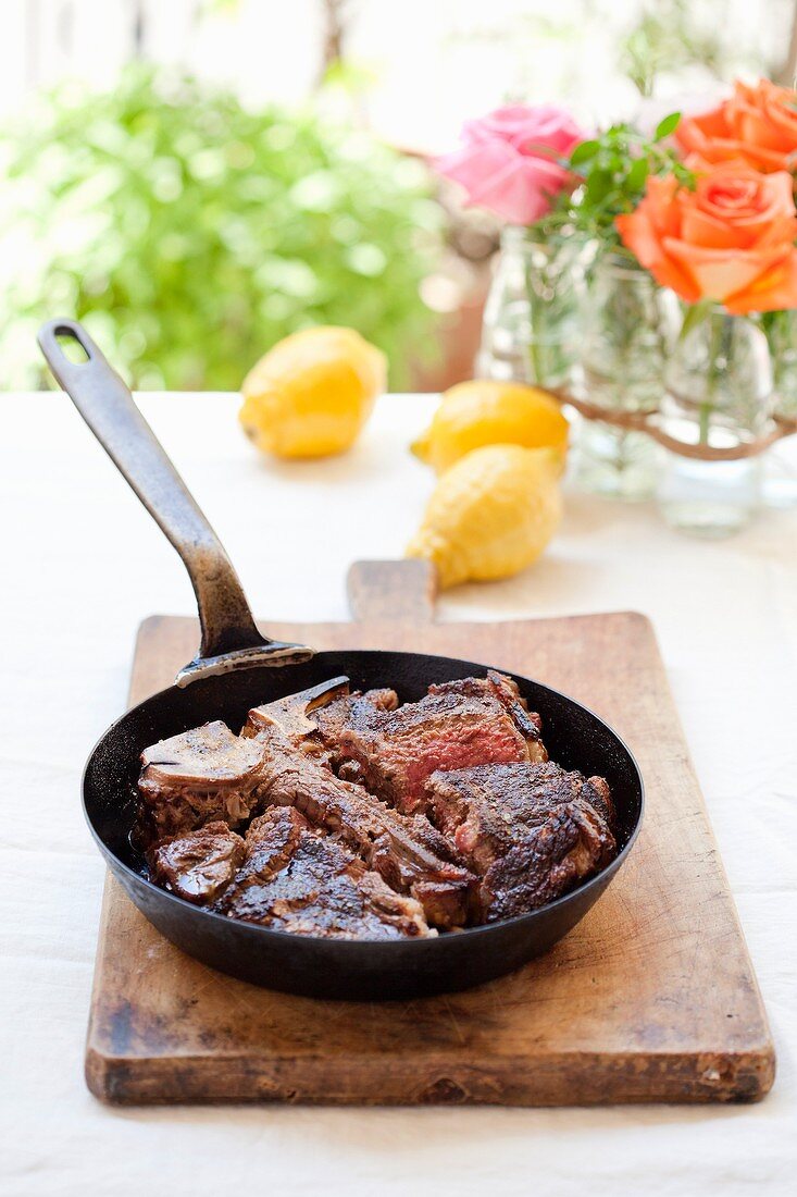 Bistecca fiorentina (T-bon steak served in the pan, Italy)