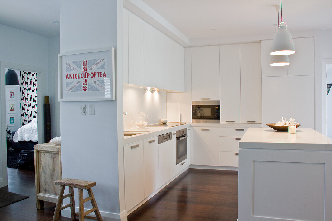 Modern kitchen in white with integrated electrical appliances