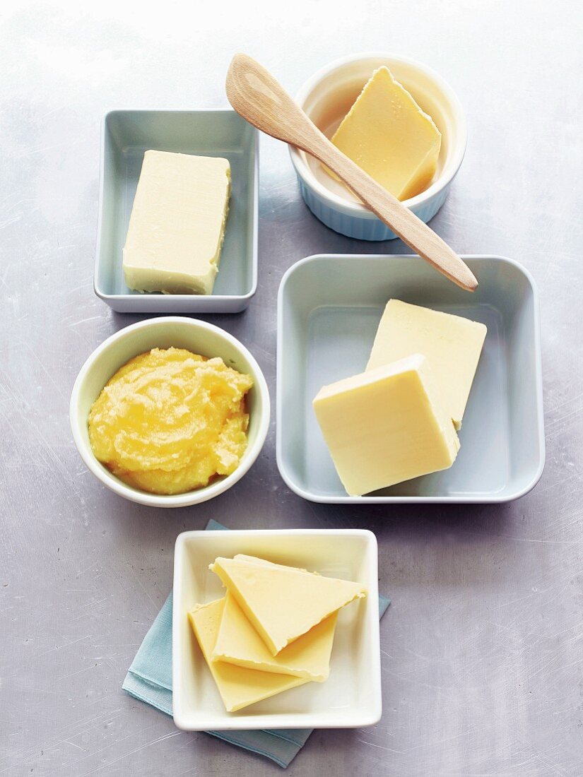 Various types of butter in bowls
