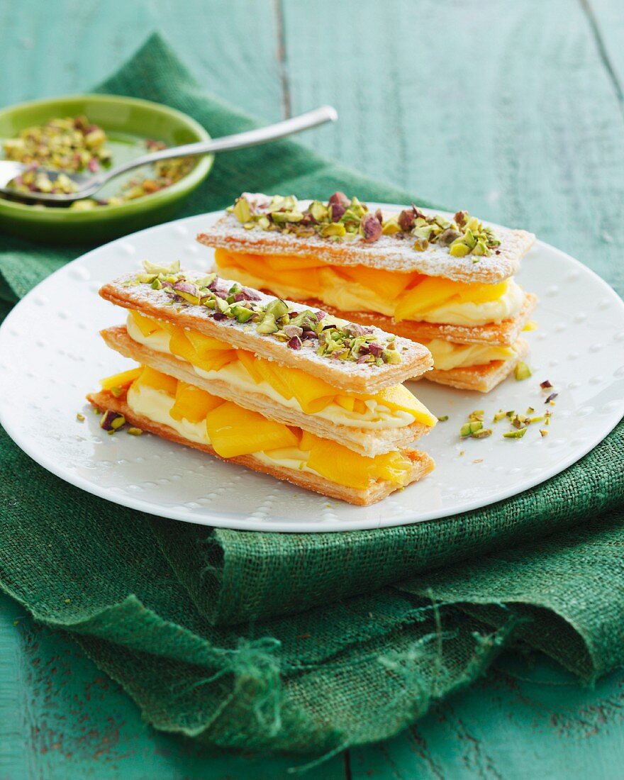 Puff pastry slices with mango, mascarpone and pistachios