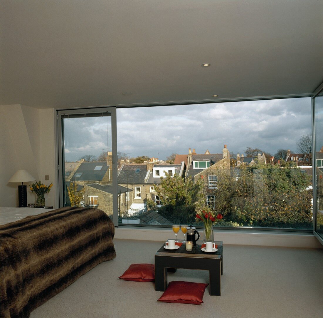 Breakfast in bedroom with panoramic window