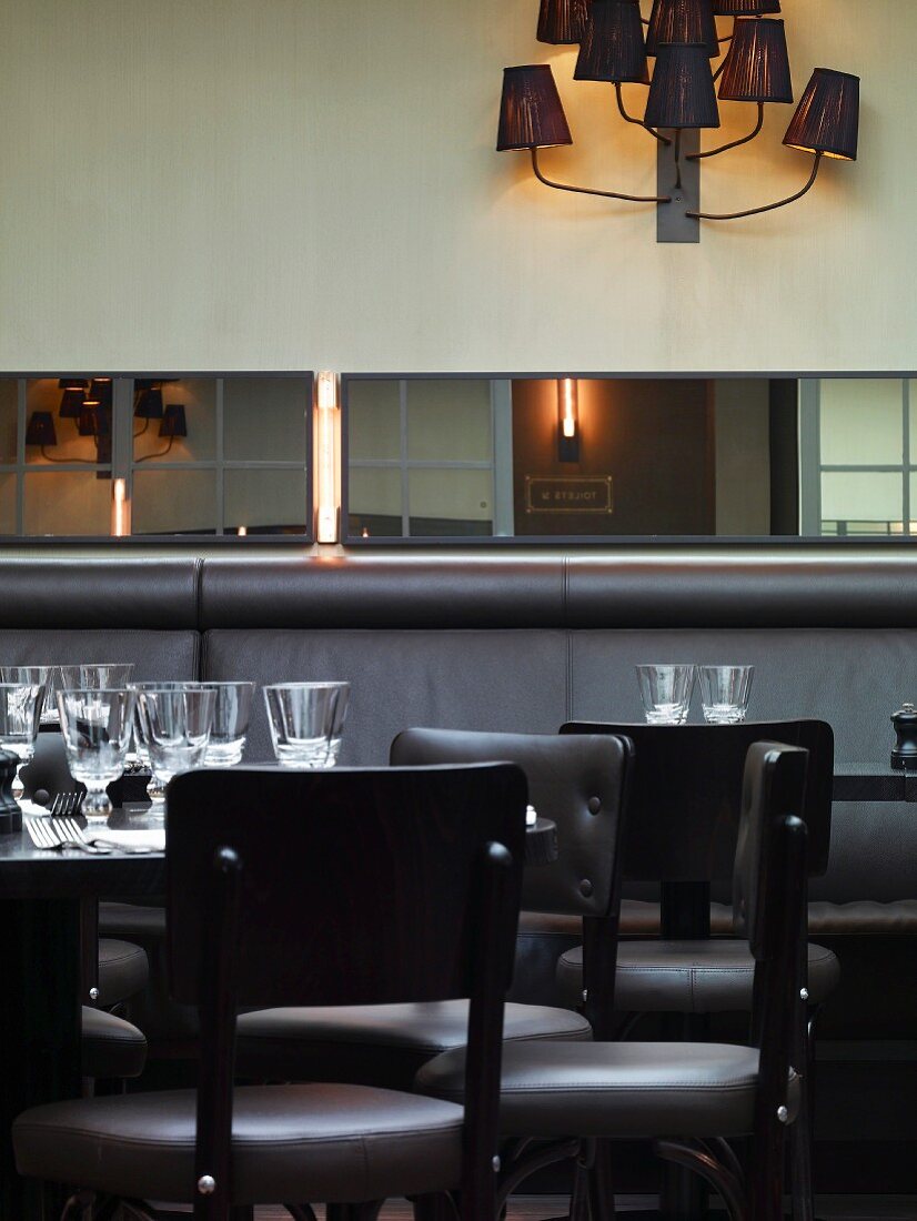 Table and chairs in Café Luc, London