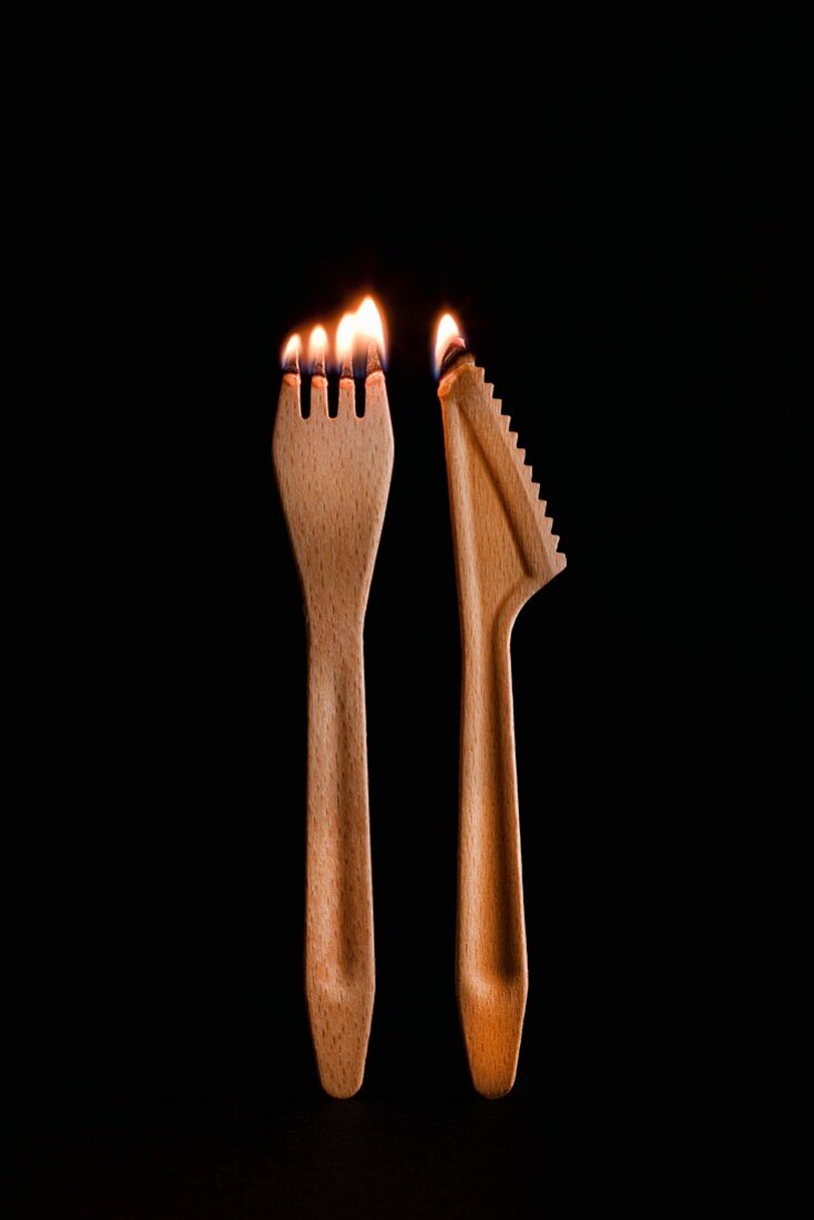 Wooden cutlery on fire