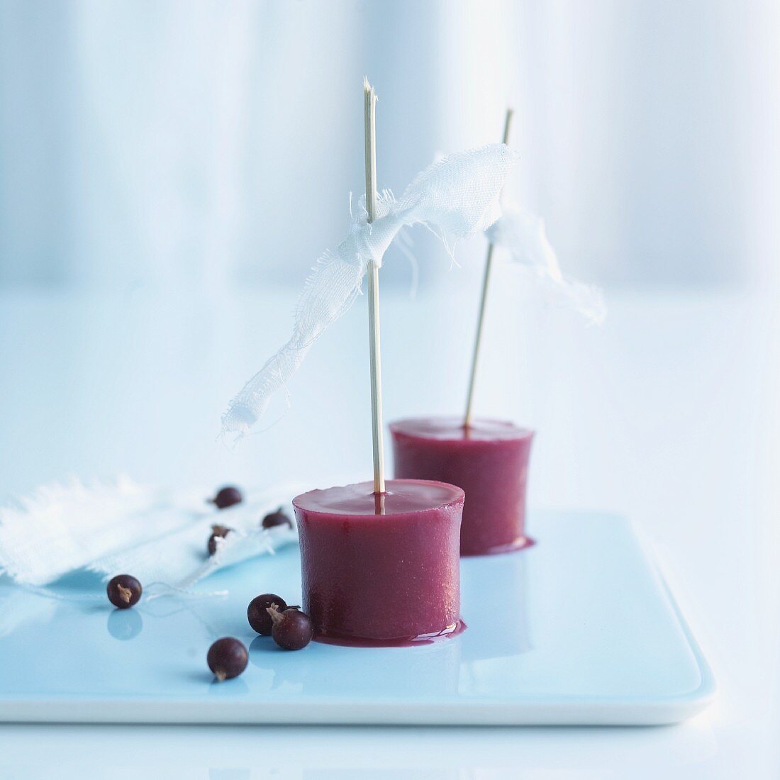 Home-made berry ice cream on sticks