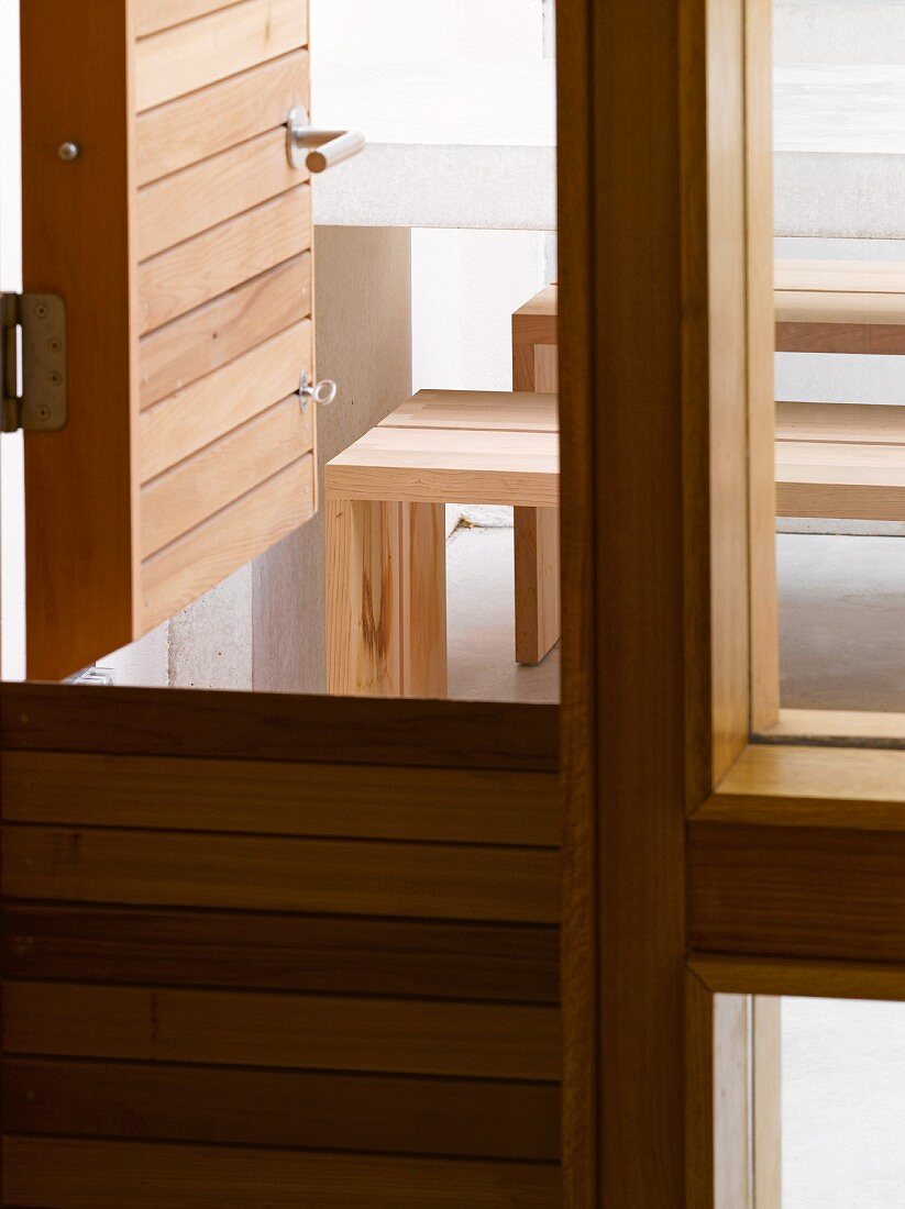 Wooden, slatted stable door leading to terrace