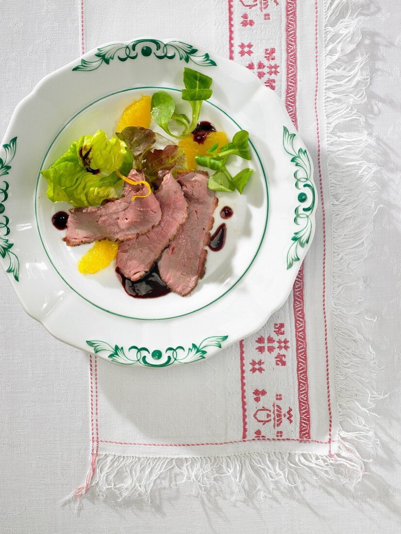 Duck breast with oranges and lamb's lettuce