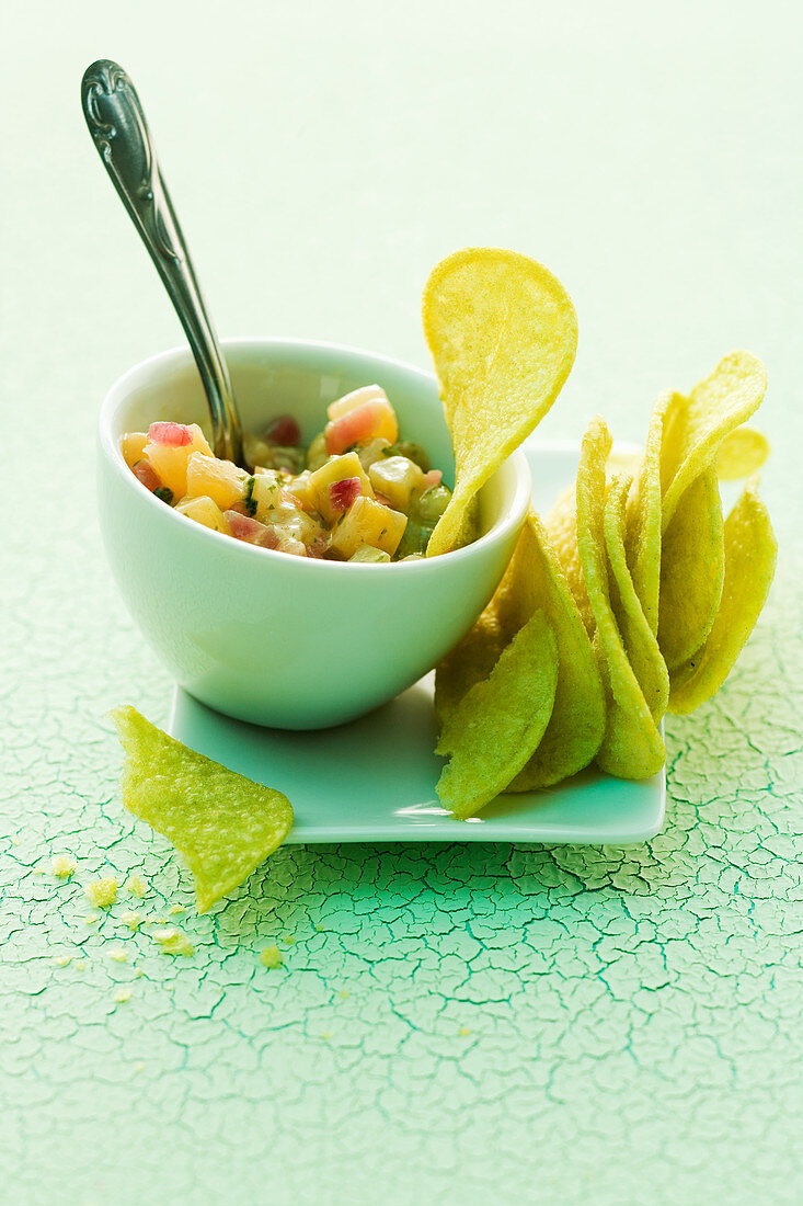 Pineapple and cucumber relish with wasabi chips