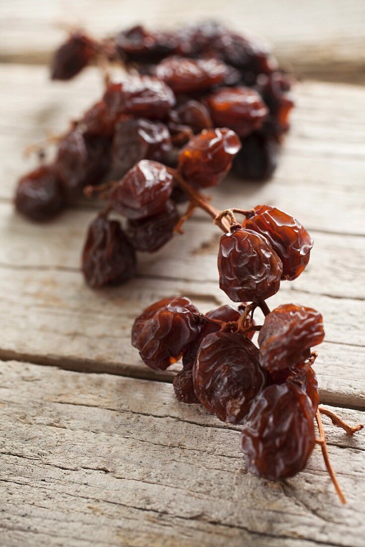 Raisins on a wooden surface