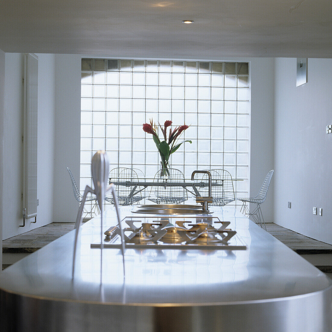 Kitchen with glass block wall and cooking island