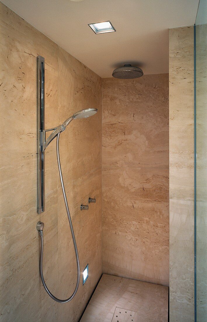 Contemporary-style shower area with marble cladding