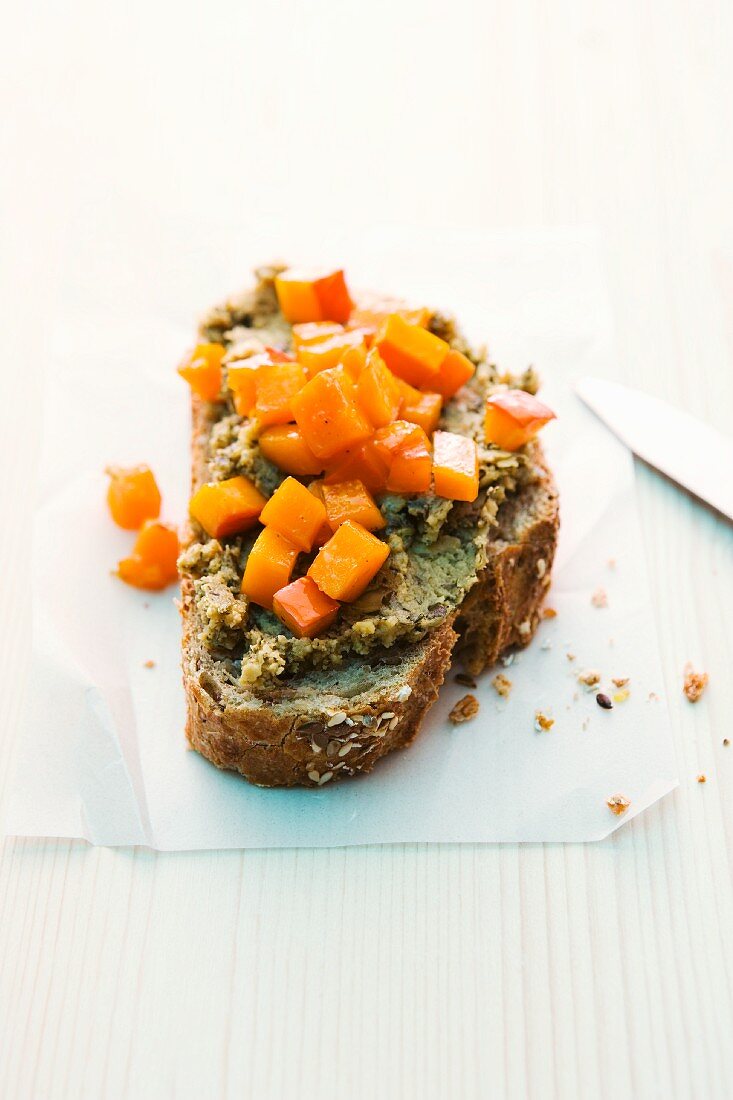 Bread with olive spread and pumpkin