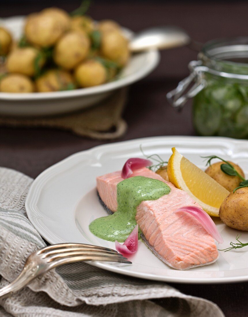 Poached salmon with herb sauce