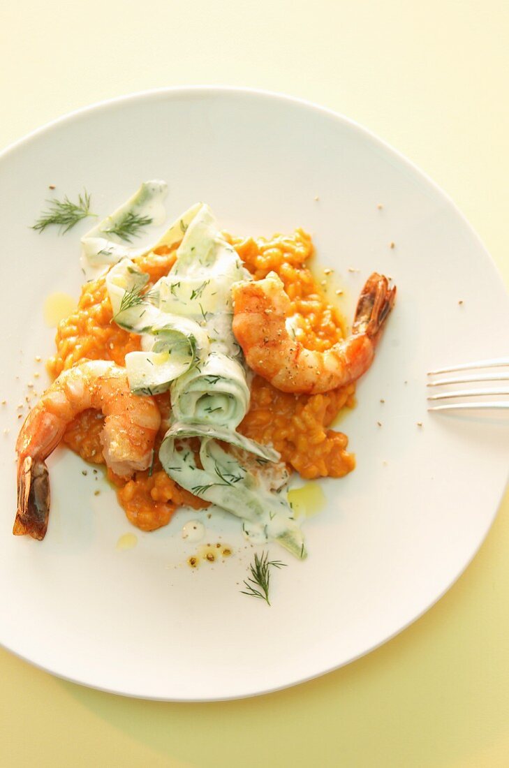 Pepper risotto with scampi, cucumber and dill sauce