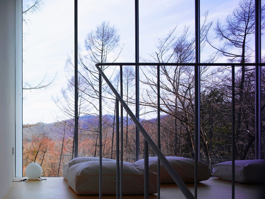 Floor cushions in front of window
