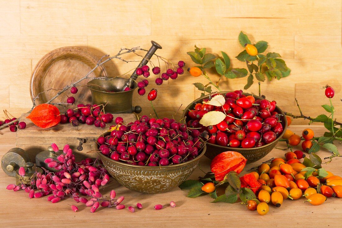 An arrangement of rosehips and barberries