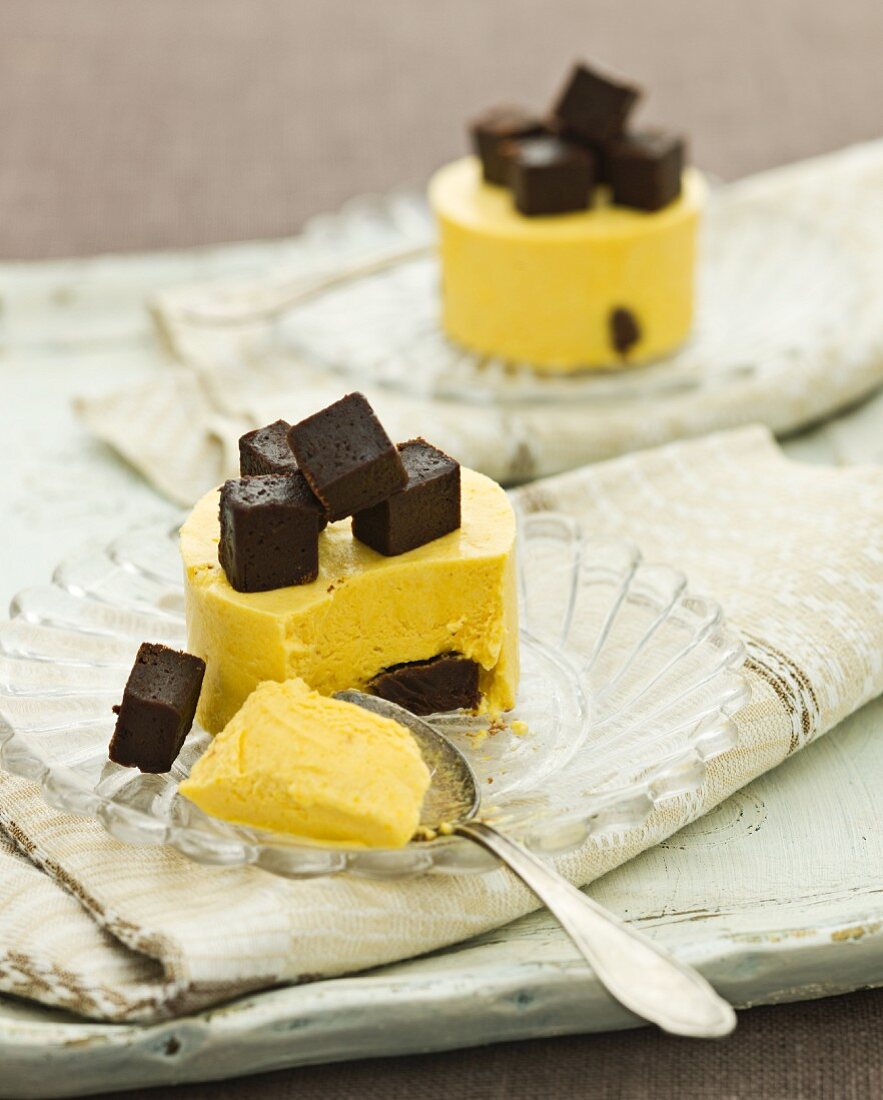 Mango mousse with brownie cubes