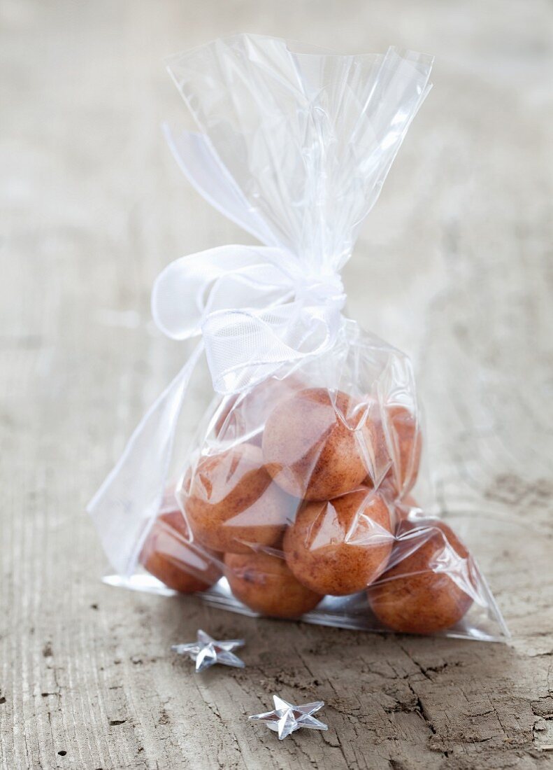 Fresh marzipan potatoes in a gift bag