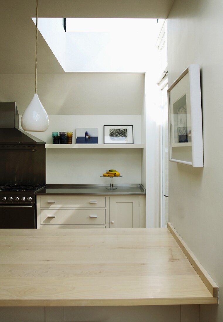 View into kitchen across counter