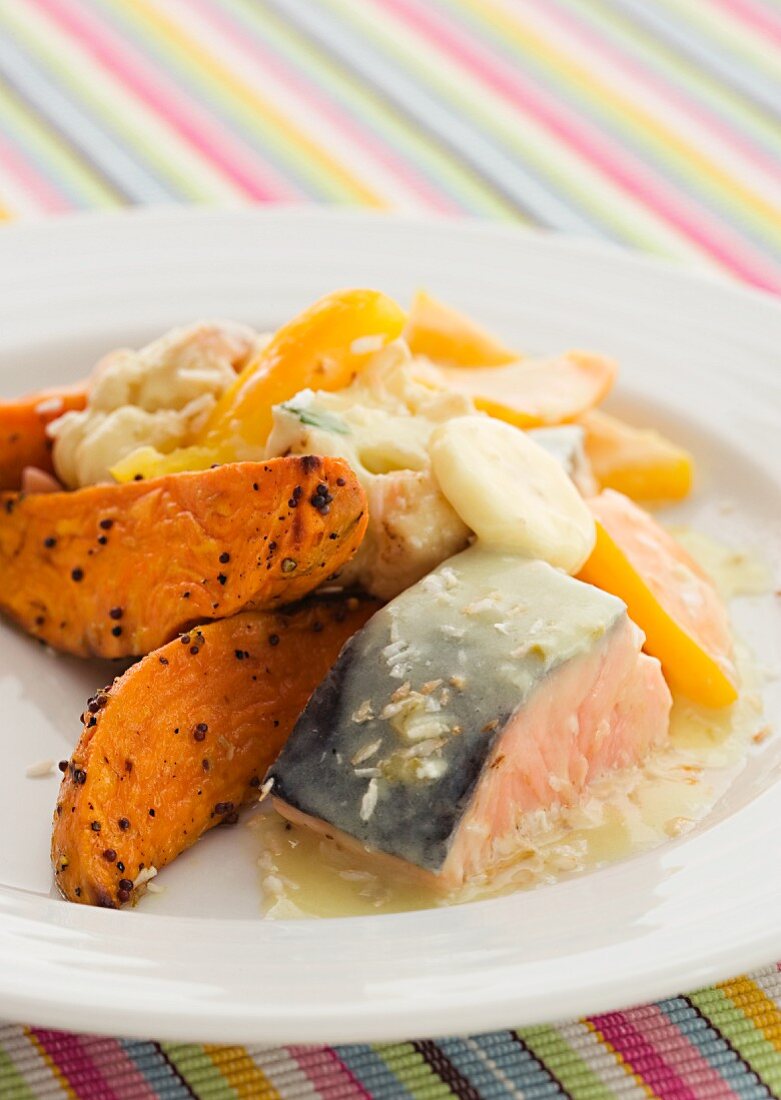 Salmon with sweet potato, orange and coconut milk