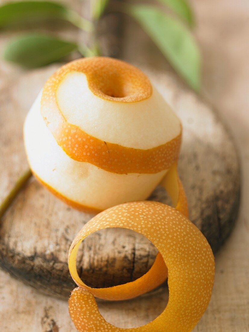 Partially Peeled Pear with Peel