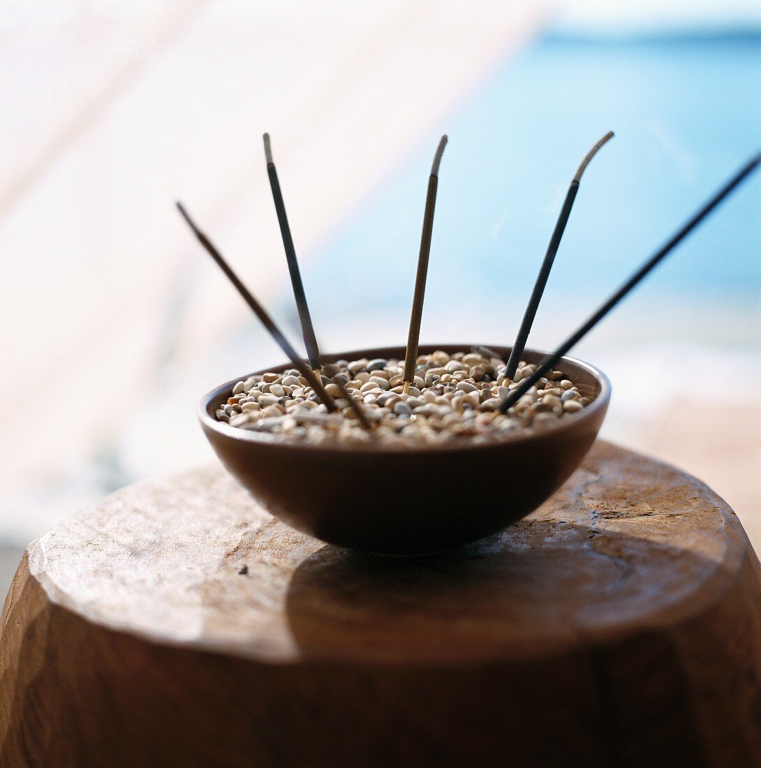 Joss sticks in a dish