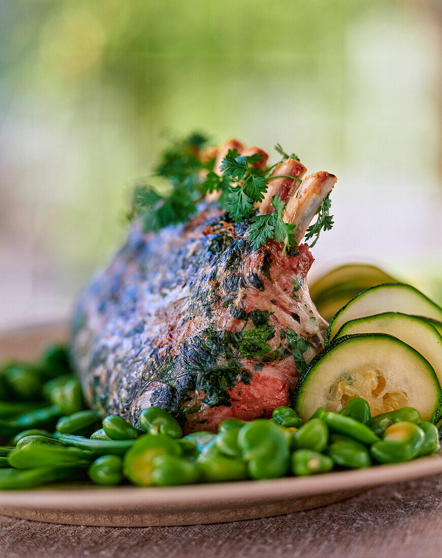 Rack of lamb with herbs and vegetables