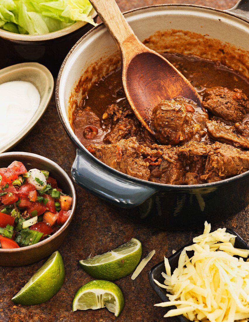 Beef chilli and chipotle, tomato salsa and cheese