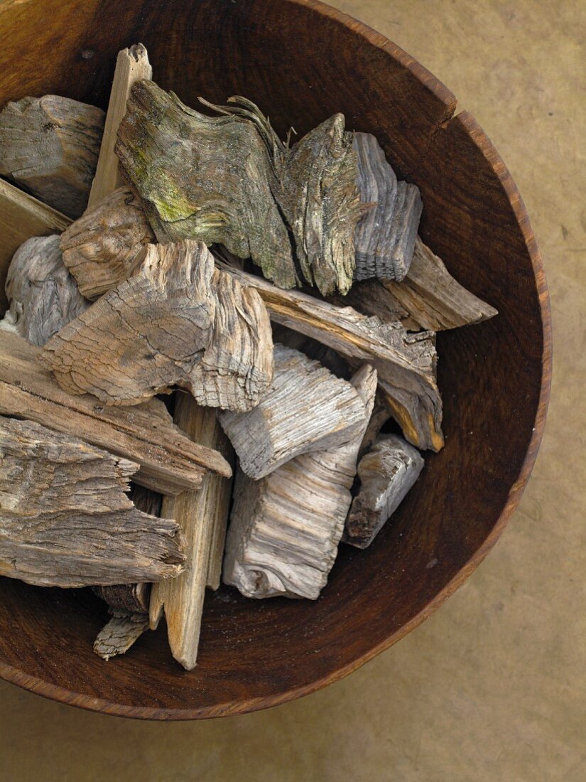 Pieces of wood in bowl (top view)