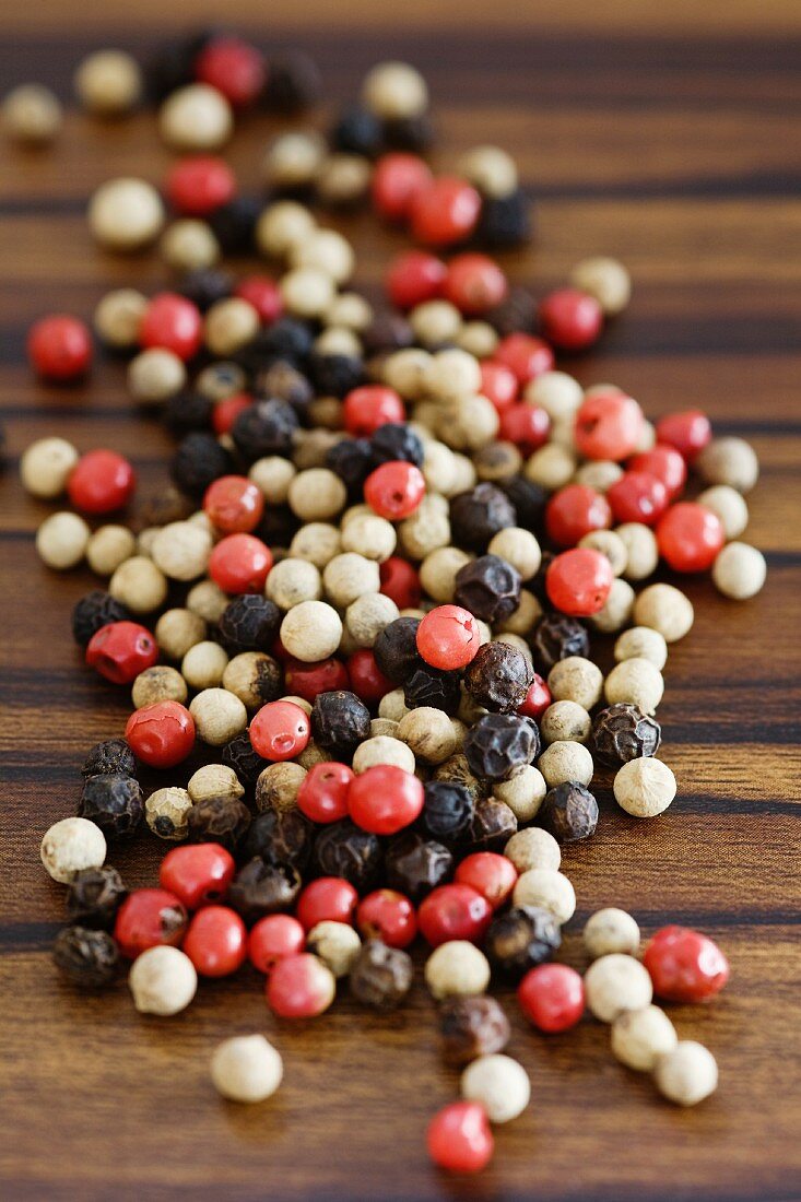 Red, white and black peppercorns