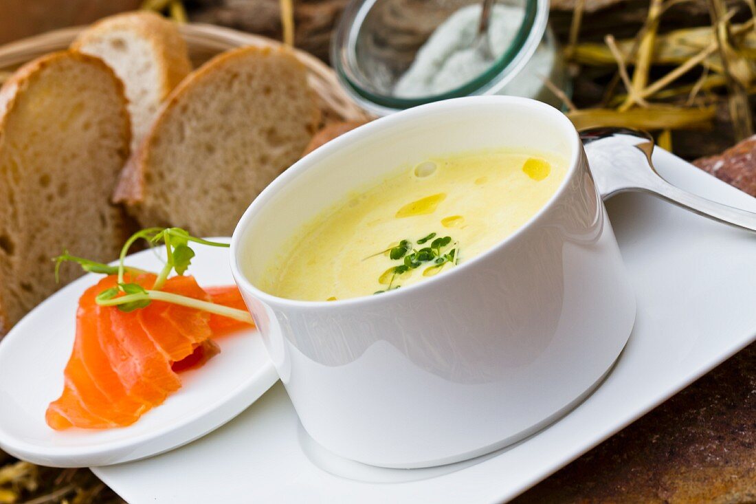Pumpkin soup, smoked salmon and bread