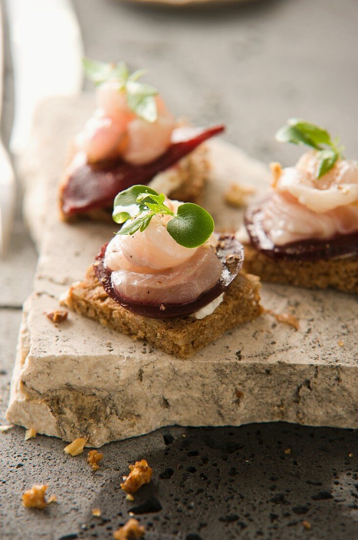 Canapes with trout and beetroot