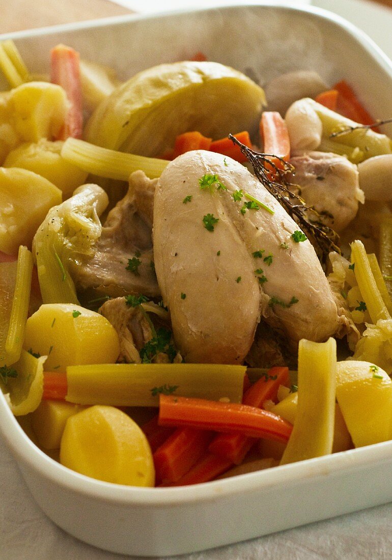 Chicken with potatoes, carrots and celery