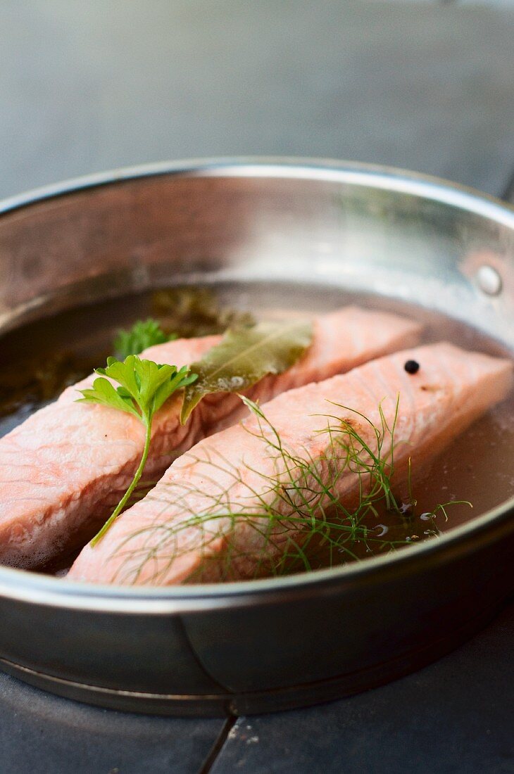 Poached salmon steaks