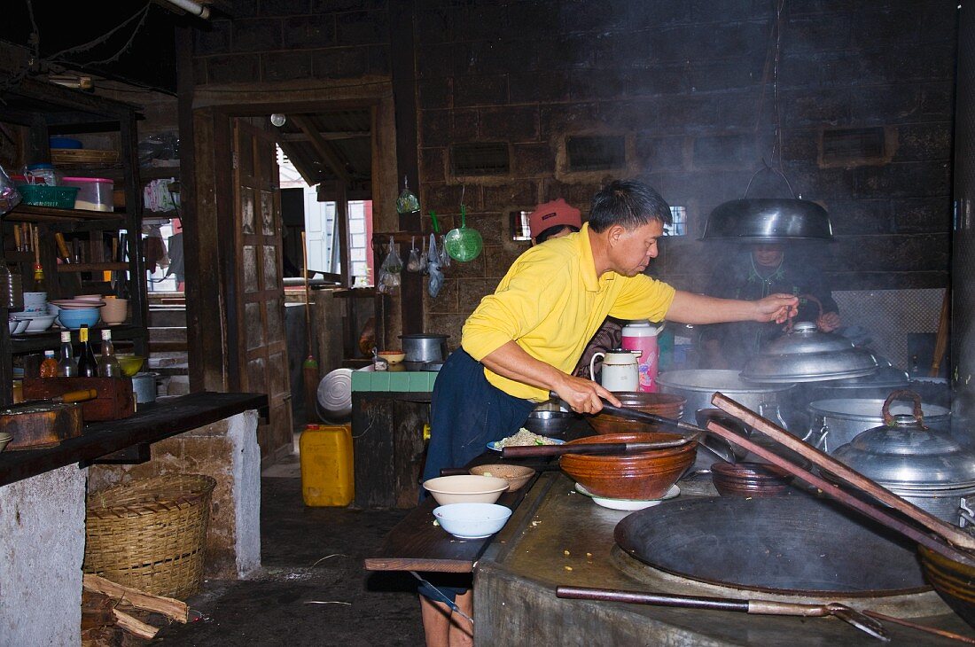 A cook in a Burmese kitchen