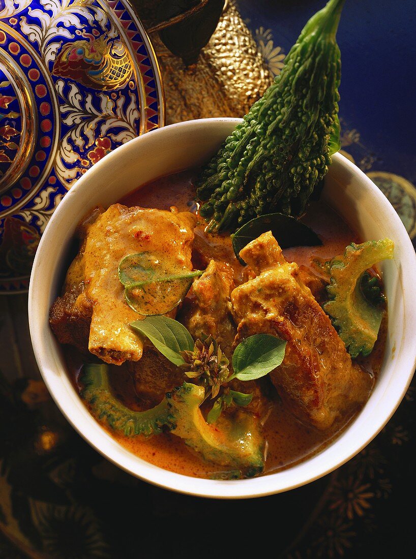 Fried spare ribs with red curry and krachai