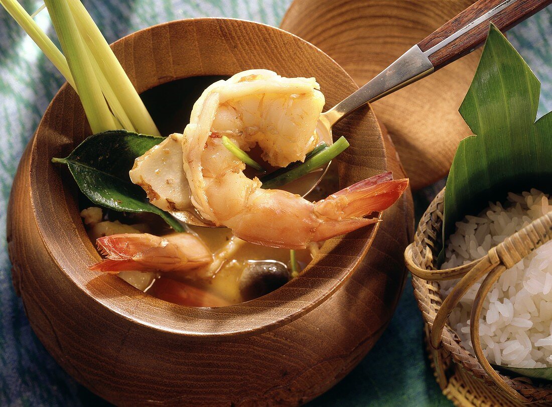 Shrimp Soup with Lemon Grass in a Wooden Bowl