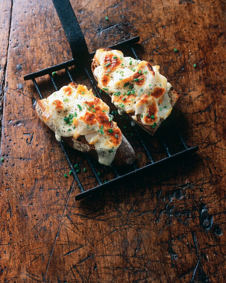 Slices of bread topped with apples and cheese